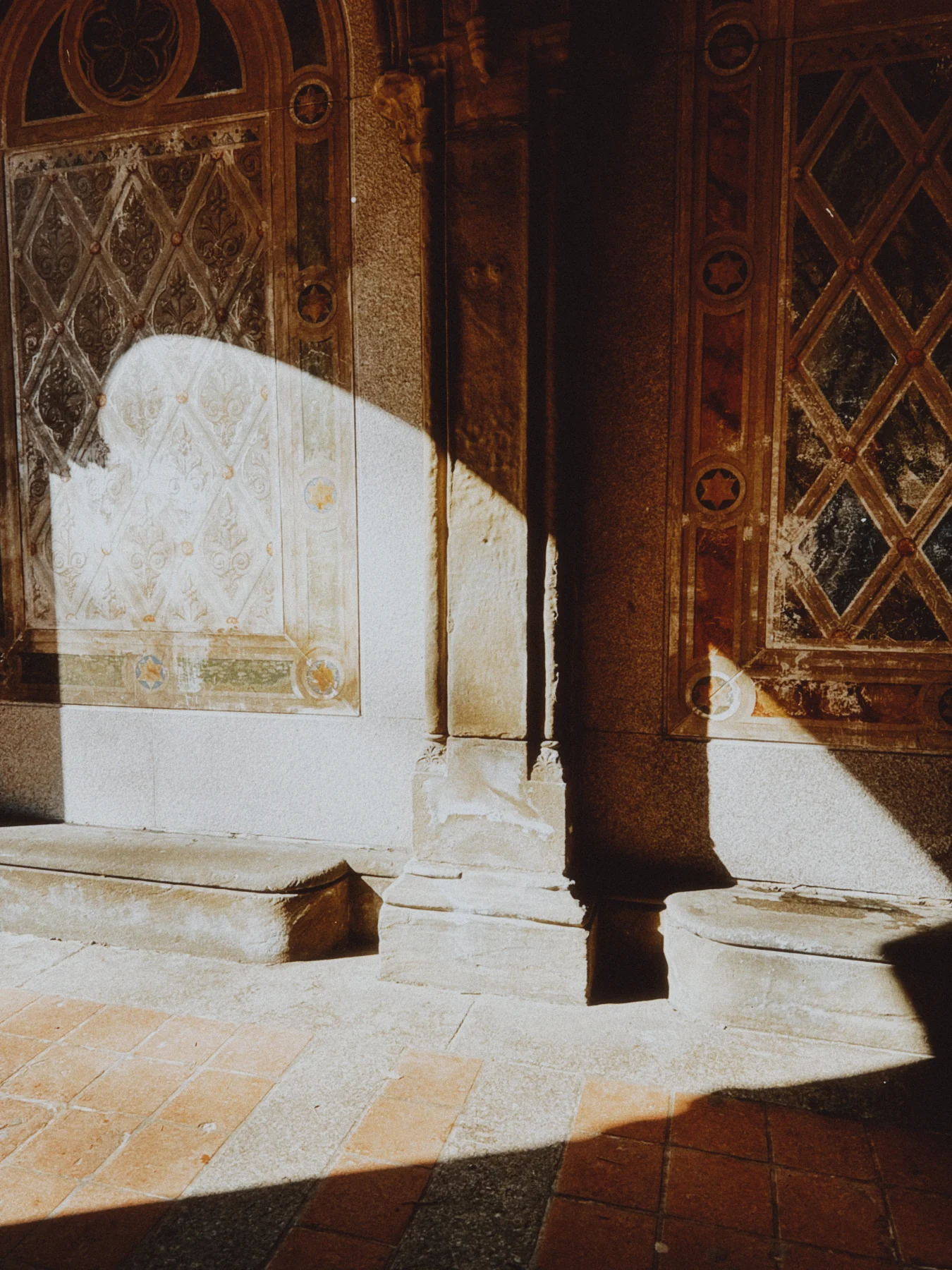 Sunlight falling through an ornate archway, developed with a warm Emulsine custom preset